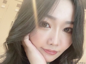  にな