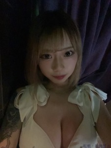  にな